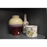 A selection of Portmeirion including dish, corked bottle and baluster vase with plum and lustre/