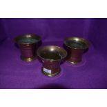 Three antique brass apothecary mortars.