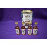 A Bowmore Miniatures Four Bottle Gift Pack containing Legend, 12 year old, 17 year old and 21 year