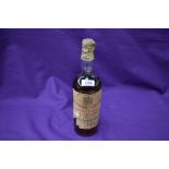 A 1929 bottle of John Dewar and Sons White Label Finest Scotch Whisky of Great Age with spring