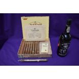 A bottle of DelaForce Sons & CA Finest Vintage Port 1975, 75cl along with a Don Tomas Cigar box