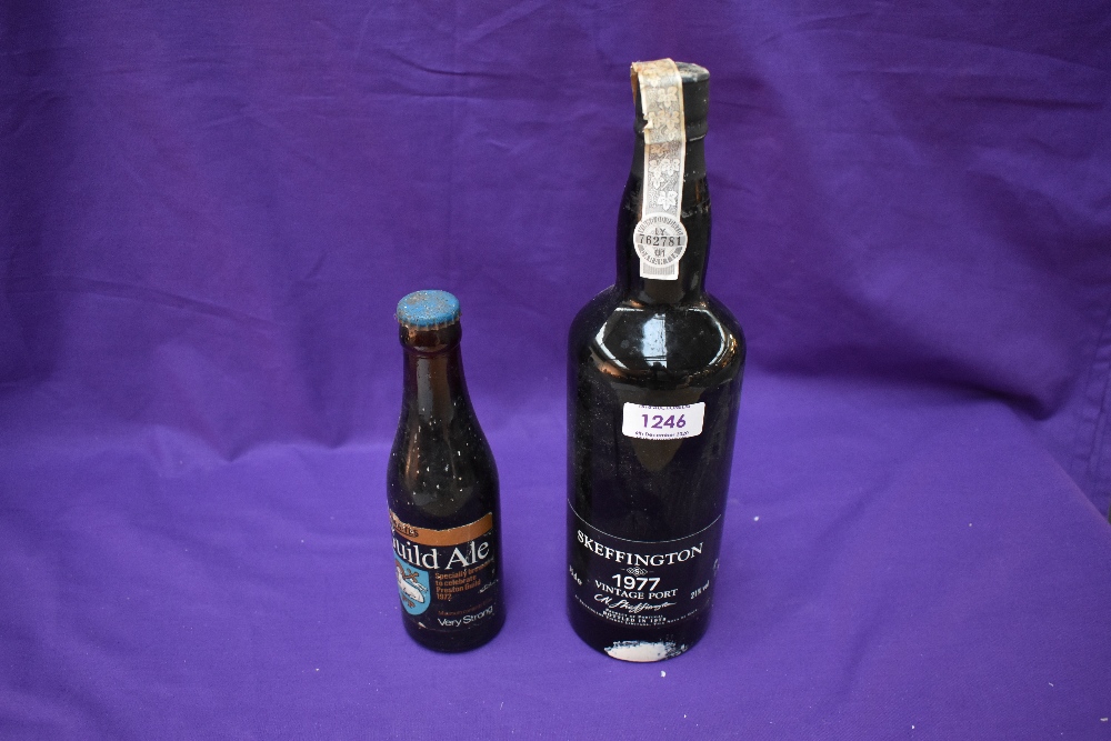 A Bottle of Skeffington 1977 Vintage Port, bottled in 1979, 75cl , 21% vol along with a Bottle of