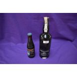 A Bottle of Skeffington 1977 Vintage Port, bottled in 1979, 75cl , 21% vol along with a Bottle of