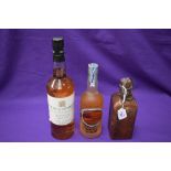 A bottle of House of Commons 8 year old Malt Scotch Whisky, 70cl, 40% vol, a 35cl bottle of Pure