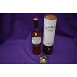 A bottle of Bowmore Islay Single Malt Scotch Whisky, aged 12 Years, 700ml, 40% Vol, in card tube