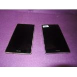 Two Asus Zenpad computer tablets.