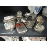 A variety of vintage plated ware including desk top lighter, salt and pepper pots in the form of