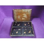 A Japanese lacquer jewellery box well detailed with imagery of insects and turtle mythology