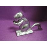 A vintage cast aluminium squirrel nutcracker.