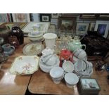A mixture of ceramics and kitchen ware including cheese dome., coasters, cups and saucers and more.