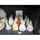 A selection of twelve Franklin porcelain figurines.