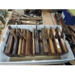 A selection of antique wood workers and cabinet makers moulding and shaping beech wood planes