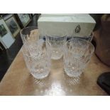 A set of five clear cut crystal whisky tumblers by Waterford with box