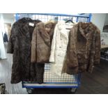 An assortment of mixed vintage fur coats,including one having a Lancaster label, various colours and