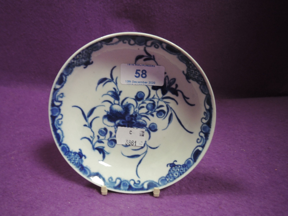 A Worcester pin dish having blue and white floral decoration, around late 1700s.