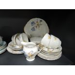 A part tea service by Durham China with floral design