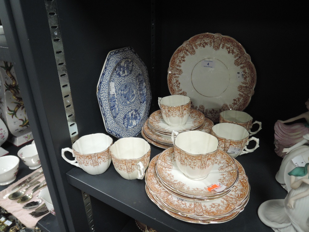 Nineteen items of Aynsley china having brown floral transfer pattern including cups, saucers and