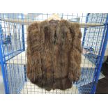 A 1940s fur cape having utility label,fully lined.