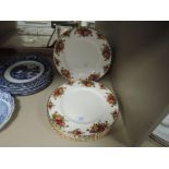 A set of six dinner plates by Old Country Roses