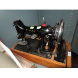 A vintage Singer 99K sewing machine.