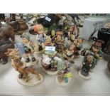 a collection of Goebel figurines and similar.