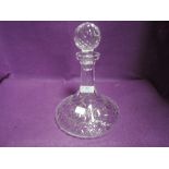 A Waterford crystal decanter.