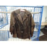 A vintage ladies fur coat, feels to be pony or similar, chestnut brown in colour and fully lined.