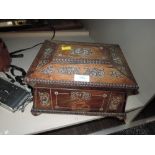 An early 20th century jewellery box, inlaid with mother of pearl and having compartmental tray to