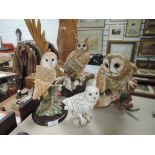 A selection of figures by Country Artists Owl figurines including Barn and Long eared