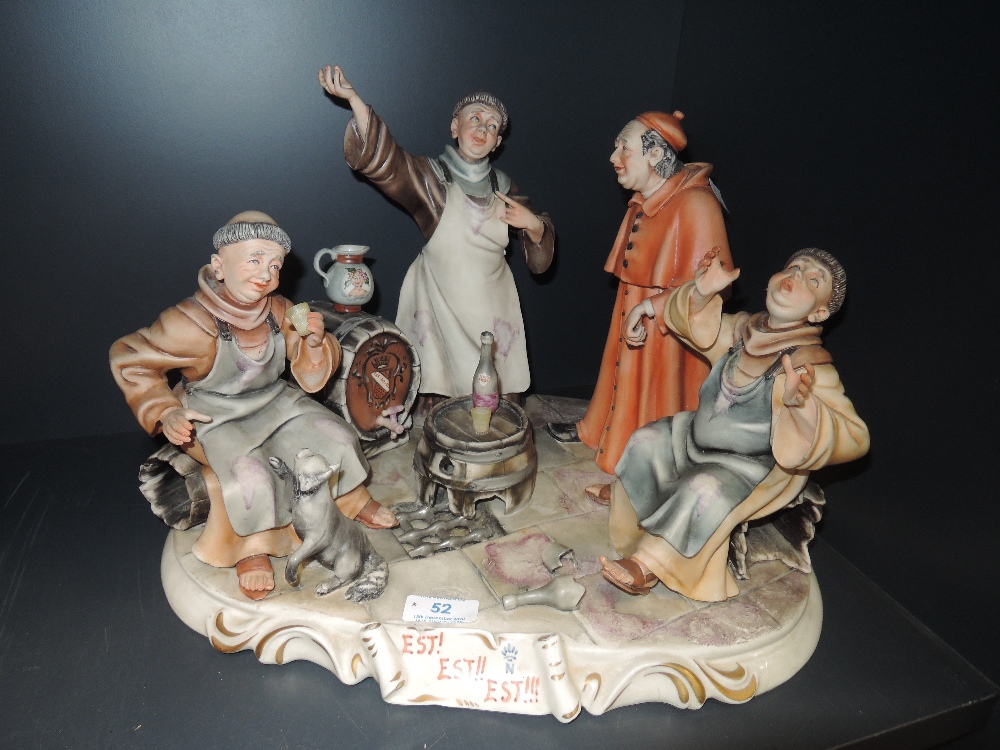 A ceramic figure base by Cappo De Monte depicting monks getting drunk
