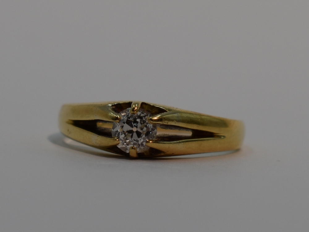 An 18ct gold signet ring having an inset diamond, approx 0.5ct to claw set mount, size S