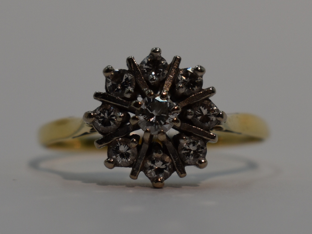 A lady's dress ring having a diamond star burst cluster, approx 0.5ct on a yellow metal loop, no - Image 2 of 2