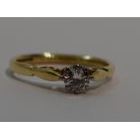 A lady's diamond solitaire dress ring, approx 0.25ct in a four claw raised mount to shaped shoulders