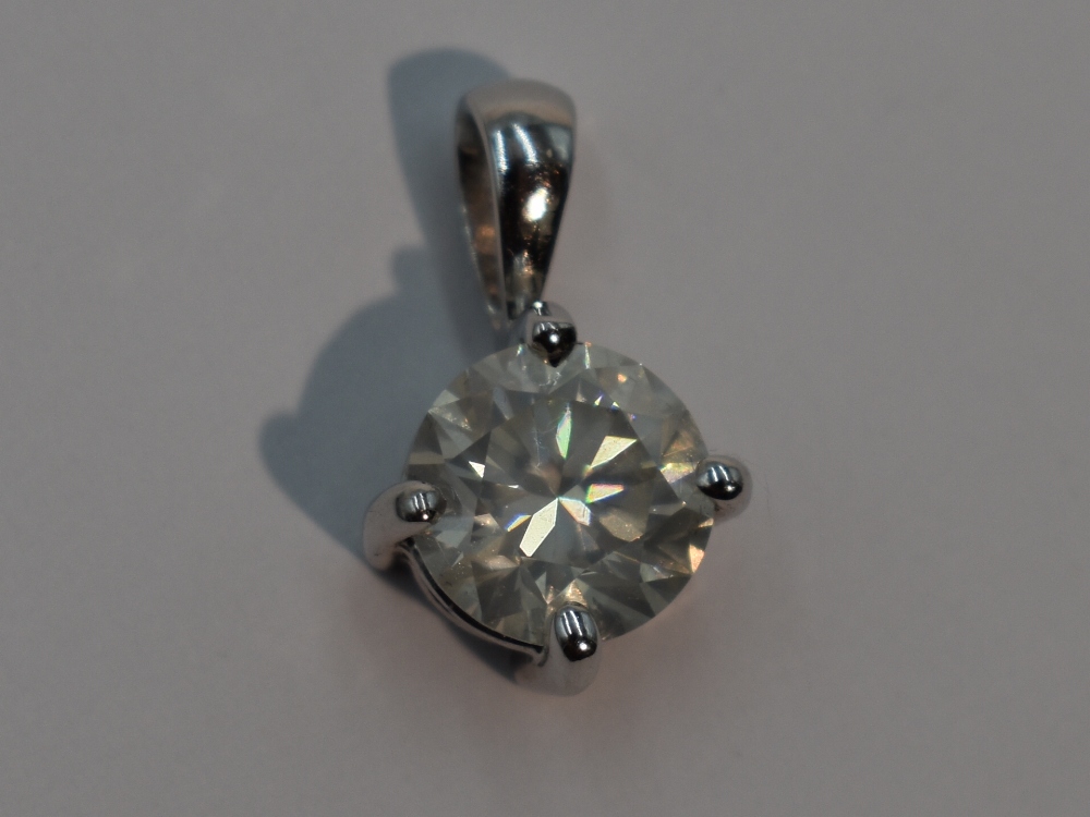 A diamond solitaire brilliant cut diamond pendant, approx 1.5ct in a claw set pendant mount, no