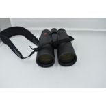 A pair of Leica 'Ultravid' 10 x 50 binoculars, No.1553583, with instruction book and Leica lens