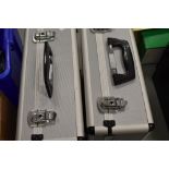 Two alloy camera cases