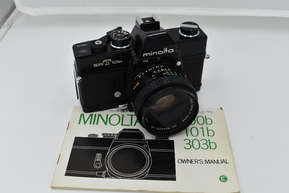 A Minolta SR T 101b camera with users manual