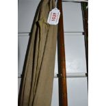 A vintage 12ft cane rod with spare tip in sleeve, unmarked