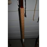 A large 14ft three peice salmon rod unmarked with sleeve