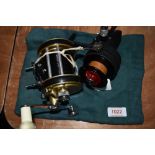 A Dam quick finessa vintage lightweight spinning reel and Policansky monitor no 2 multiplier reel.