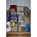 An assortment of vintage tackle including fly reel, hooks and lures,some hooks in original Hardy