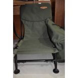 A Ron Thompson course fishing chair in unused with sideplate rod holders in bag.