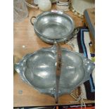 Two arts and crafts style pewter bowls one traditional twin handled by Roundhead and a Liberty
