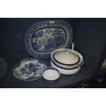 A assortment of blue an white ware including large platter and tureen with lid and matching ladle.