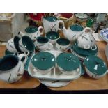 A collection of Denby including teapots,jugs,plates,tureens and more around twenty nine items.