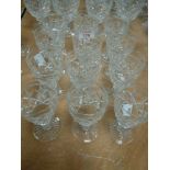 A selection of clear cut and crystal glass claret or wine glasses in the Victoria design by Stuart