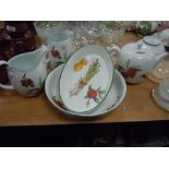 A selection of Royal Worcester table and kitchen wares in the Evesham Vale design