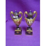A pair of highly decorated mantle urns bearing Royal Vienna beehive stamp to base hand painted to