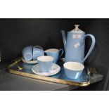 A mid century Johnson Bros blue and white partial coffee set having floral accents with similarly