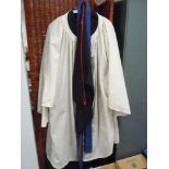 A selection of vintage clerical garments.